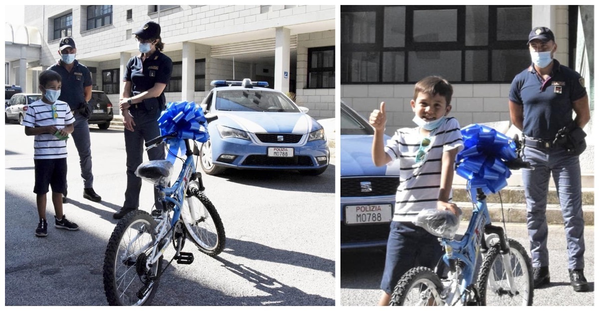 menino bicicleta policial