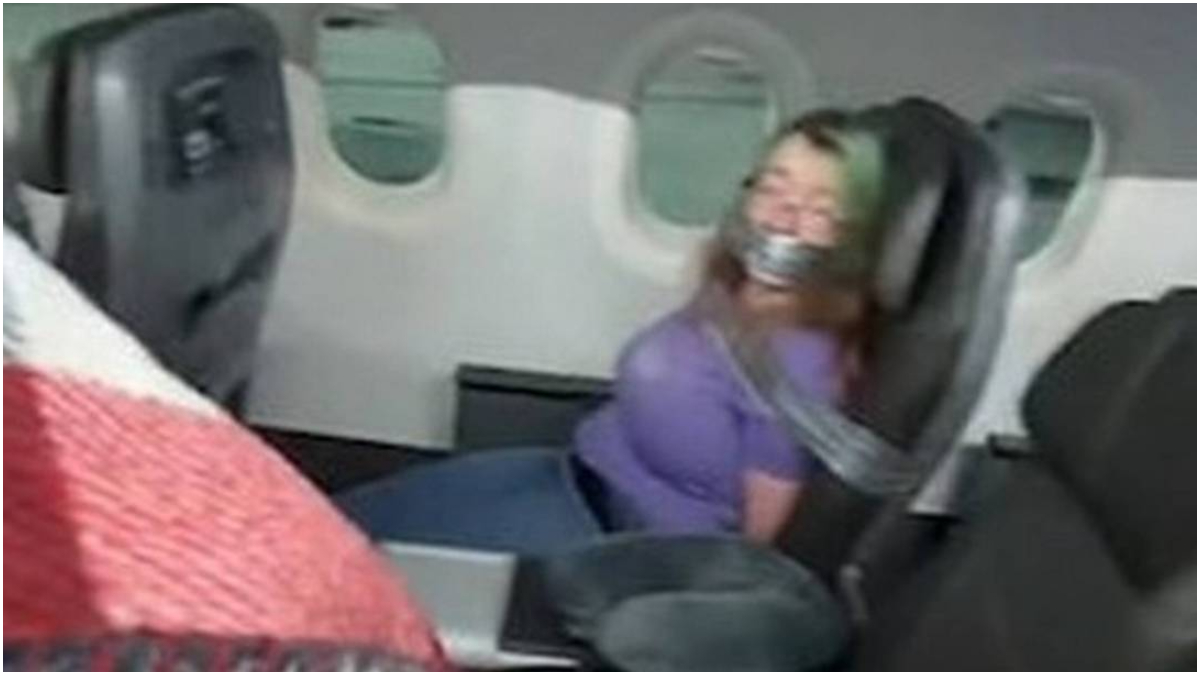mulher presa em avião eua