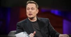 Elon Musk veste blazer e camisa preta