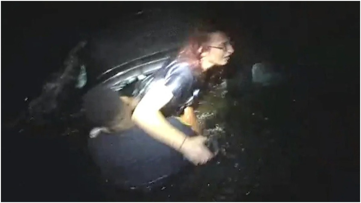 policial salva mulher presa em carro