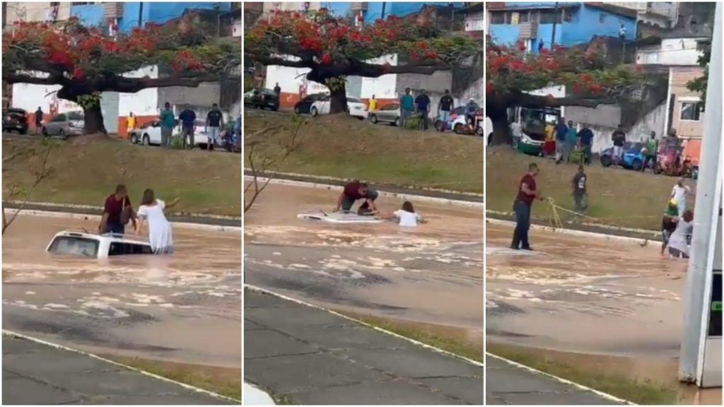 carro engolido água