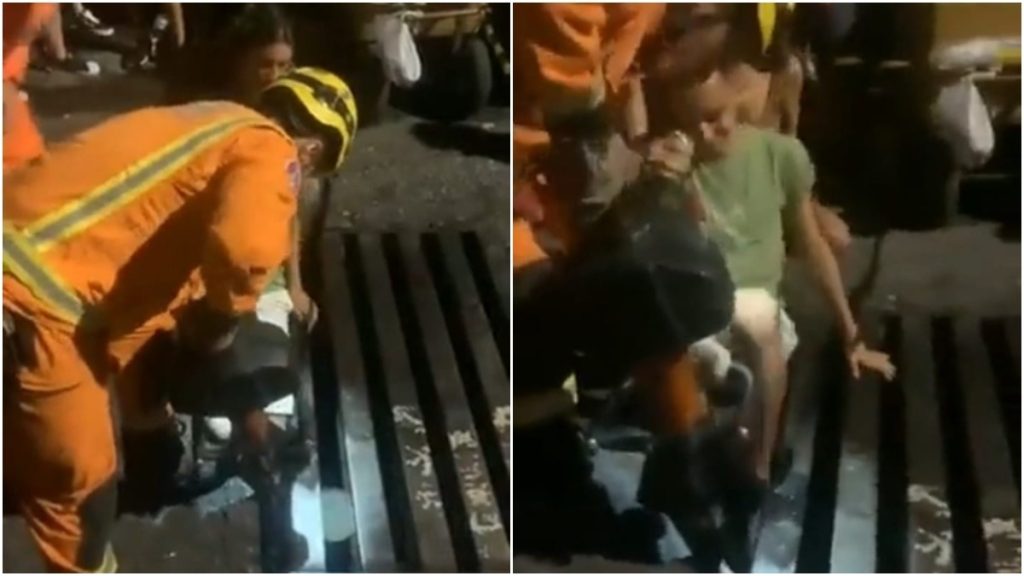 jovem fica com perna presa bueiro