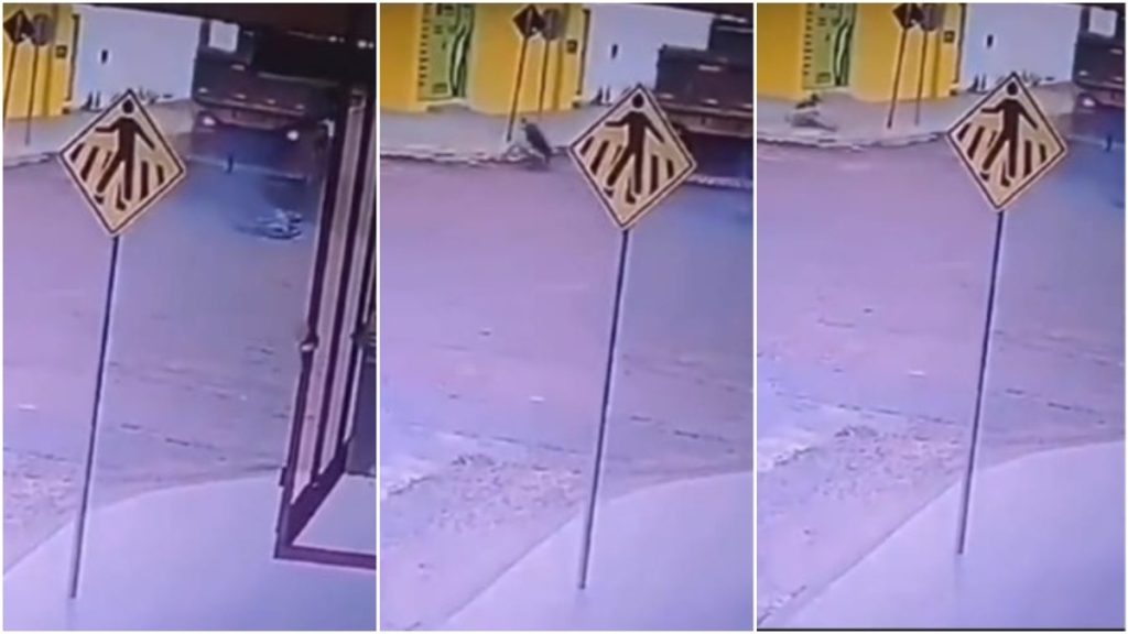 motociclista escorrega caminhão