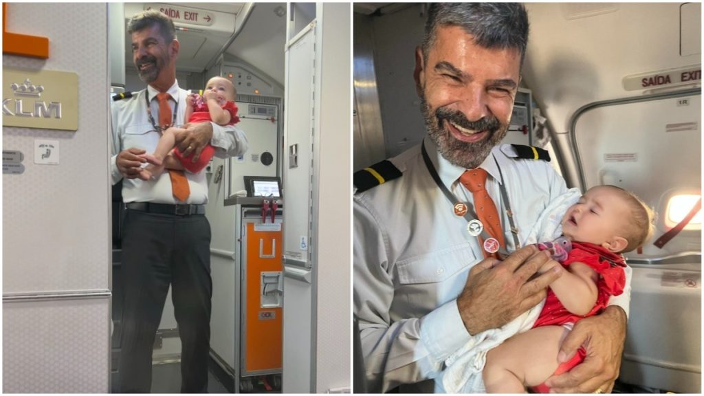 comissário segura bebê