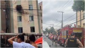 mulher em frente a prédio que teve incêndio madre gertrudes e viaturas dos bombeiros no local