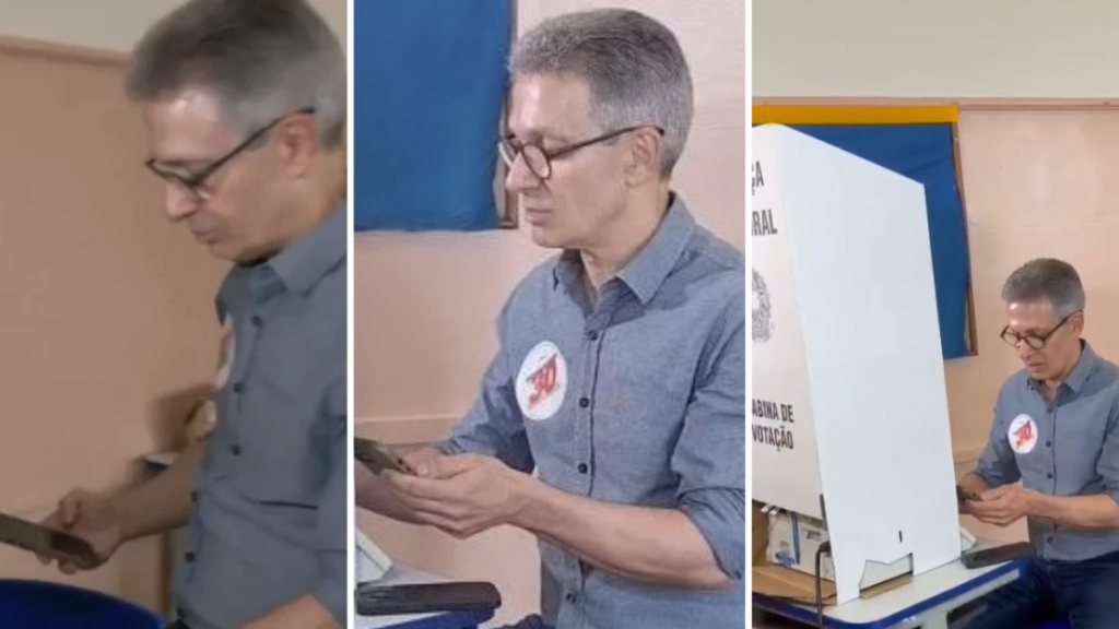Zema usa celular na cabine votação