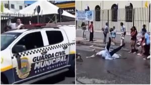 Padre cai de viatura da Guarda Municipal ao jogar água benta em fiéis em BH